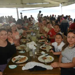 2024 Feast of Tabernacles Panajachel, Guatemala a group of people sitting at tables
