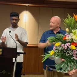 2024 Feast of Tabernacles Penang, Malaysia a man teaching a younger man to lead songs