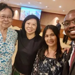 2024 Feast of Tabernacles Penang, Malaysia four people standing indoors and smiling