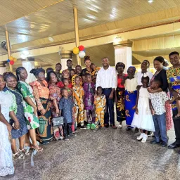 2024 Feast of Tabernacles Ìgbàrà-Òkè, Nigeria a group of people standing in a semicircle indoors