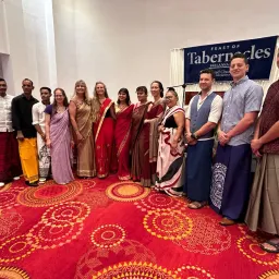 2024 Feast of Tabernacles Kalutara, Sri Lanka a group of people indoors, some wearing traditional clothing