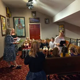 teenagers seated indoors