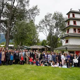 a group of people outside near a building