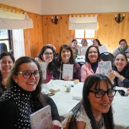 a group of people seated indoors