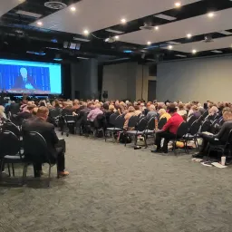 2024 Feast of Tabernacles Aransas Pass, Texas people seated indoors to watch a video sermon