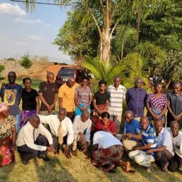 Feast of Tabernacles 2024 in Zambia a group of people outside in the shade of a tree