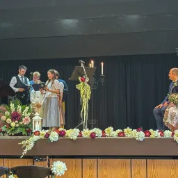 people on stage performing music