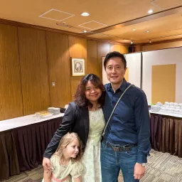 a couple and a little girl