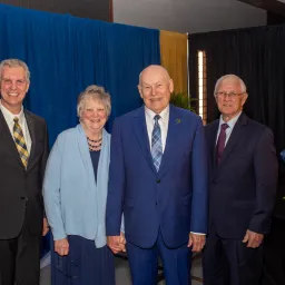 four people on a stage
