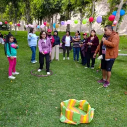 a group of people playing a game outside