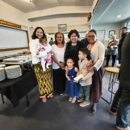 a group of women and girls indoors