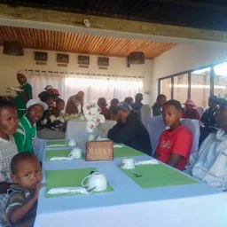 a group of people seated around a table