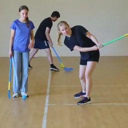 UYC British Isles children using hockey sticks