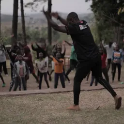 a camper demonstrating an exercise 