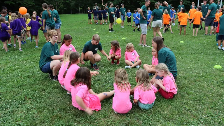 campers sitting in a circle