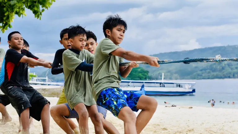 Boys playing tug of war