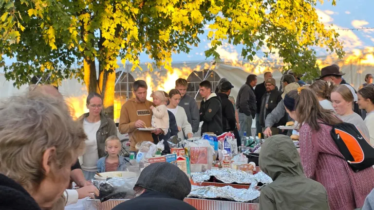 people seated at a table for a meal