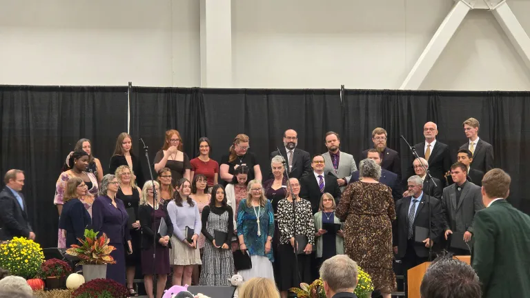 a choir singing on stage