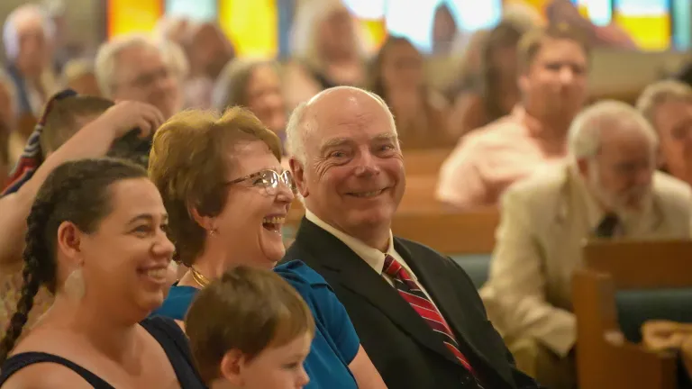 a group of people seated indoors