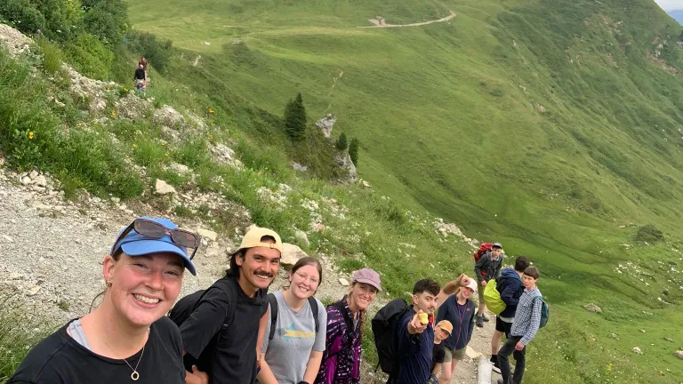 hikers on the side of a mountain