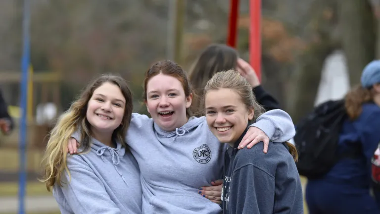 When you come to camp, remember why you’re here. You help create “the Zone” with your contributions to the group. three teenage girls