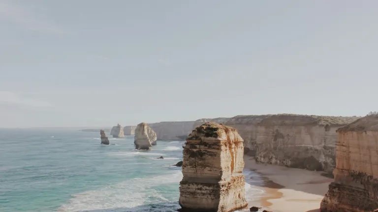 rock formations on the beach and in the water