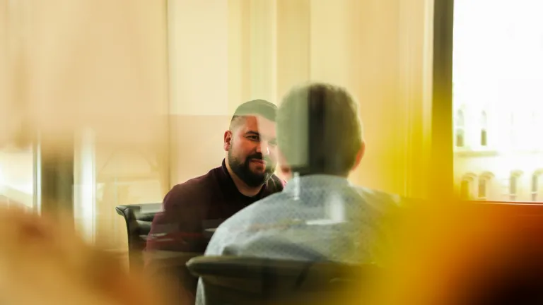 Conflict is a natural part of life, but with God’s help and gracious communication, we can turn disagreements into opportunities to live peacefully and shine as lights in a troubled world. Two guys talking.