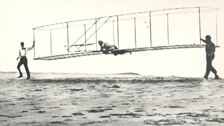 A photo of the Wright brother's first flight.