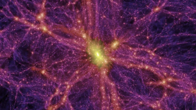 Crackles of orange streak across a purple background, representing tendrils of dispersed material in the cosmic web that unites all galaxies.
