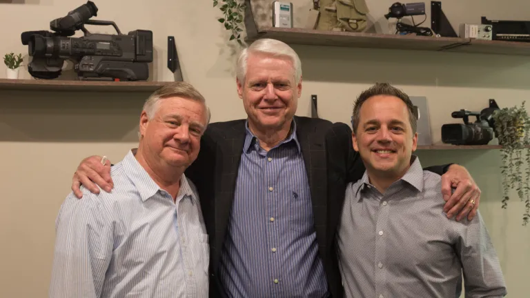 L-R: Peter Eddington, John Elliott, Scott Delamater three man standing indoors