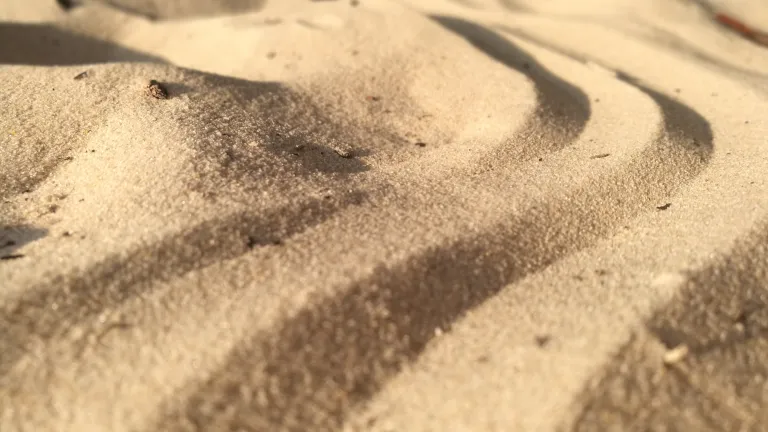 Where do we draw the line in the proverbial sand when it comes to forgiveness? an expanse of sand with lines drawn across it