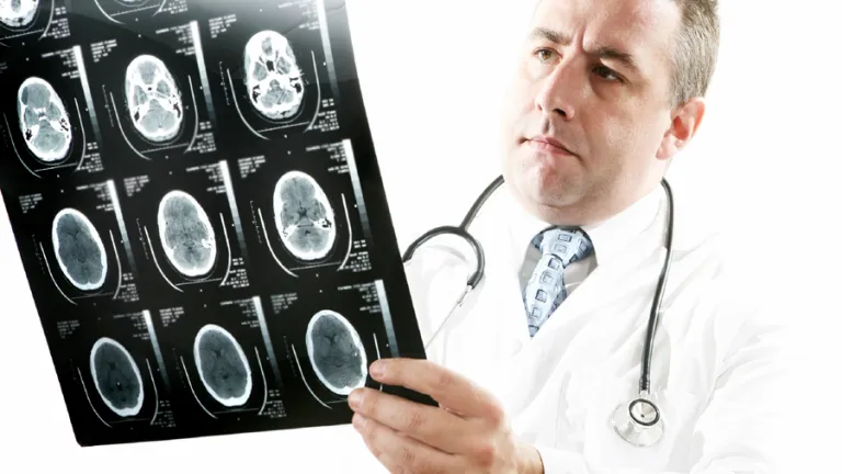 Science can tell us a a great deal about our bodies and treat many illnesses and injuries. But science cannot tell us why we exist and what the future holds for humanity. A doctor holding an xray.