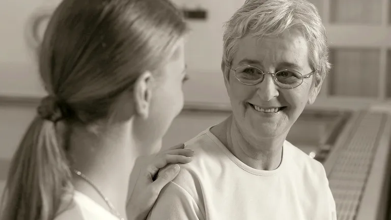 When dealing with trials, it’s vital to keep in mind such important principles as sharing the load with others, guarding your health, maintaining a positive attitude and not losing faith in God. Two women talking.
