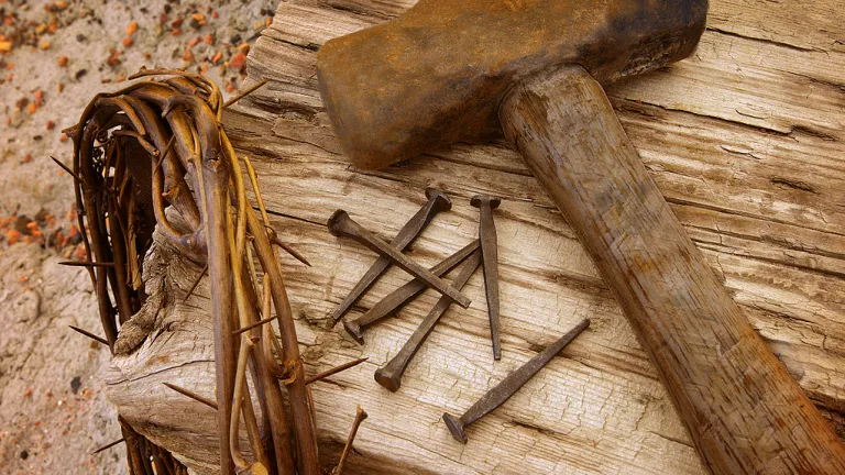 Crown of thorns, old nails and old hammer.