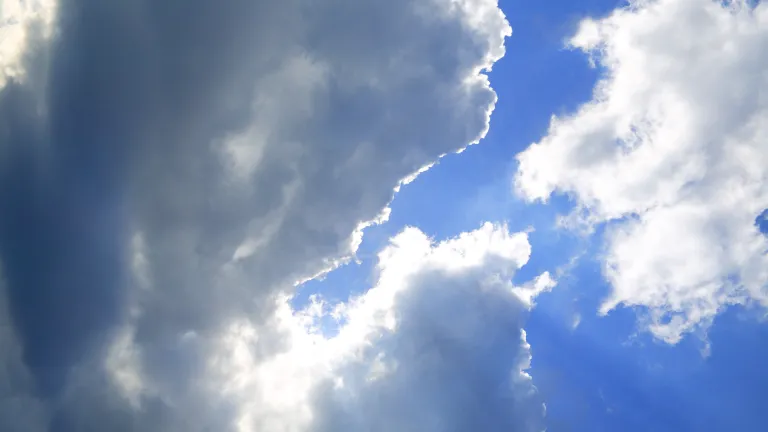 Heaven is typically characterized as a place of unsurpassable happiness—the ultimate paradise. It is commonly taught and believed that all who go there will live joyfully forever. A blue sky with clouds and sun rays.