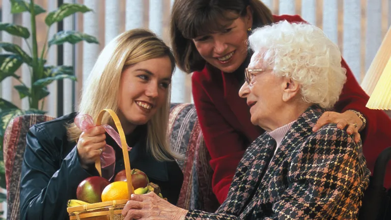 Spending time with a older lady in wheelchair.