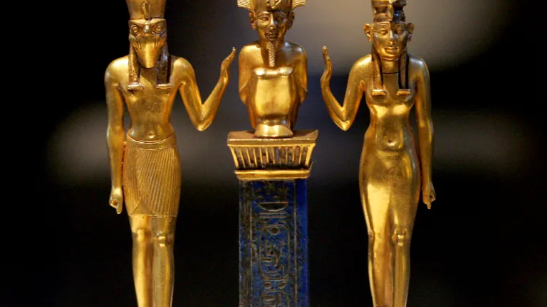These gold figurines represent one of the Egyptian trinities of gods—Osiris (center), flanked by Horus (left) and Isis. Gold figurines of Egyptian gods Osiris, Horus and Isis
