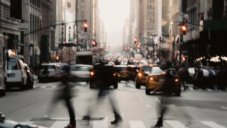 A busy hectic street in a big city.