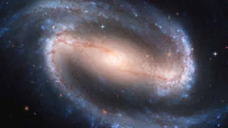 God, Science and the Bible: Does Life Exist Somewhere Out There? Photo of a galaxy.