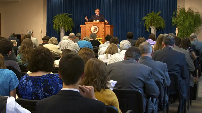 A church congregation listening to a sermon.