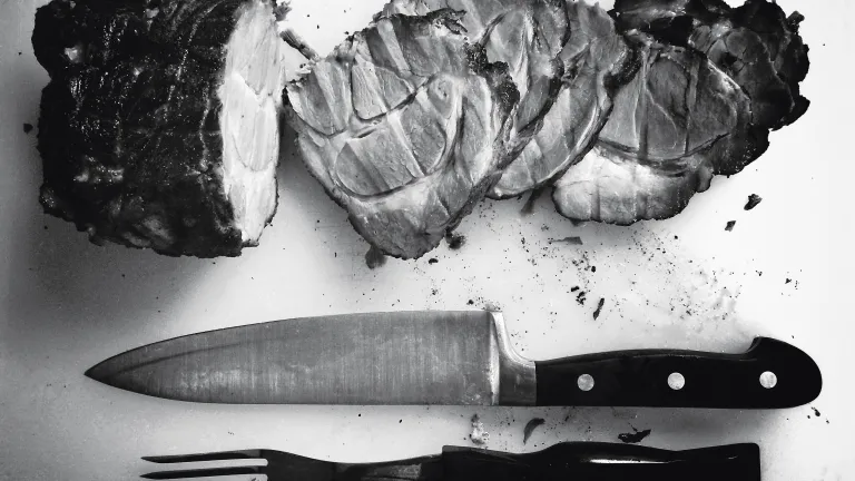Not only a matter of diet Sliced meat on chopping board
