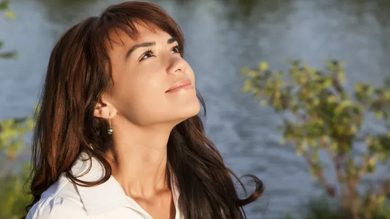 It's vital that we focus on the big picture—that God's intervention and coming Kingdom are just around the corner. A woman looking up at the sky.
