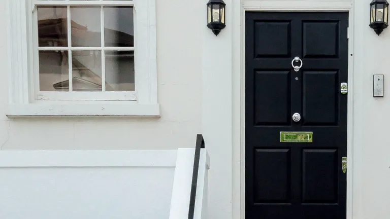 Not only in today’s world do we guard the doors to our physical homes, but we need to also guard the doors to our hearts and minds. A door of a house.
