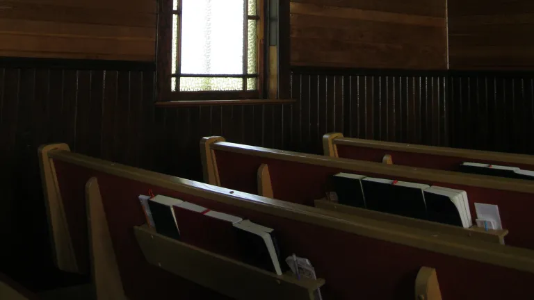 Pews inside a church.