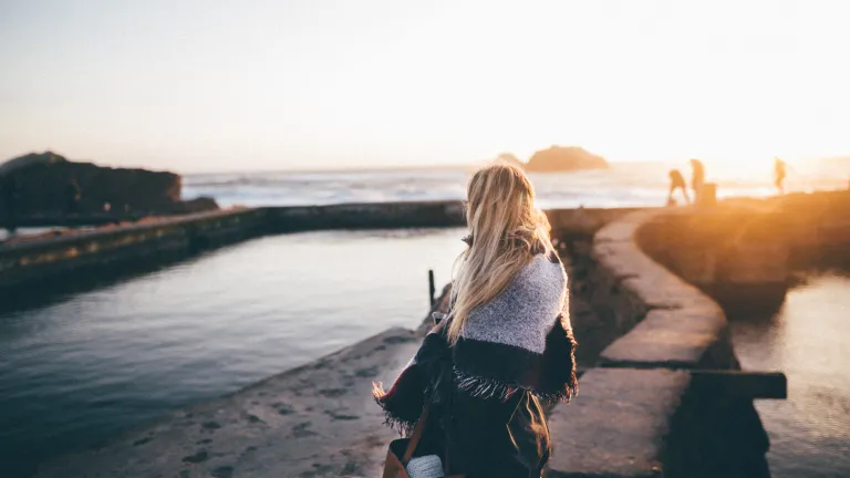 If anything is more important to us than following God, we have a real problem. A young woman with a blanket shawl wrapped around her.