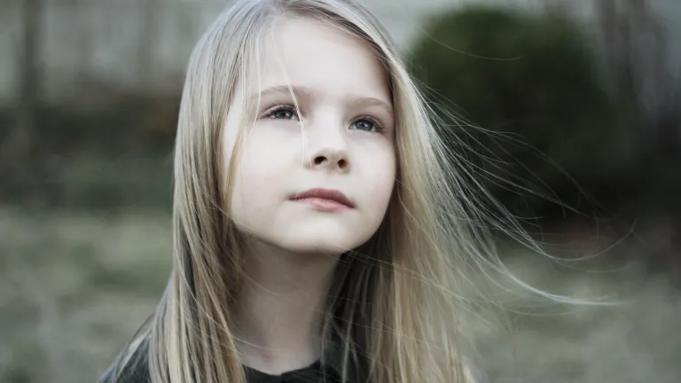 Teach your children to pray, because they matter to God! A young girl looking up.