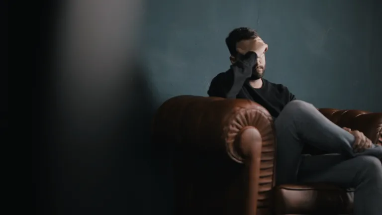 Many have struggled with various problems and sins for years or even decades. Some have become “spiritual casualties.” Fasting helps to prevent this tragedy. A man sitting on a chair holding his head with his hand.