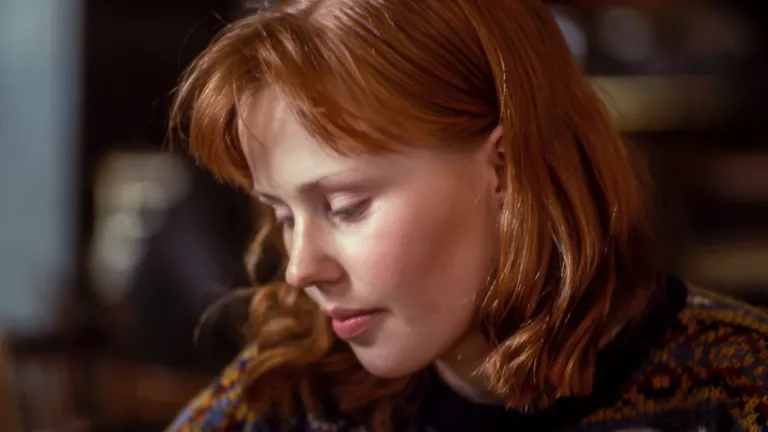 A woman looking down..