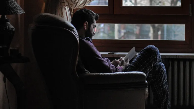 If you are struggling to overcome certain sins which crop up again and again in your life, why must you ask yourself: Do I really understand repentance that works? Am I really willing to practice it? Am I truly willing to change? A man sitting in a big chair by a window reading.