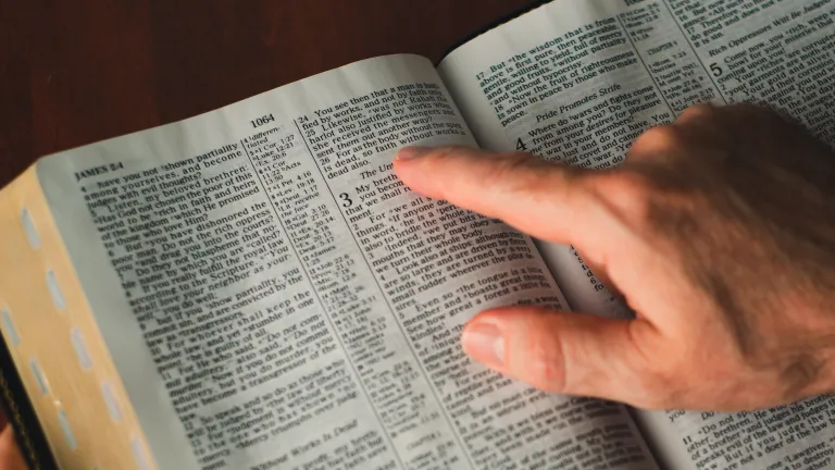 As the apostle James, Jesus’ half brother, points out, belief is pointless unless it is backed up by action and obedience. A Bible opened to book of James.